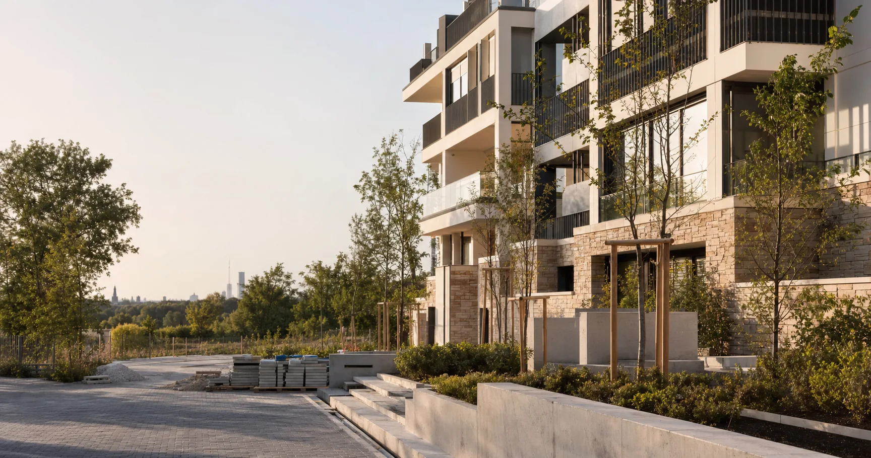 Modernes Wohnbauprojekt mit Außenanlage und Pflasterarbeiten